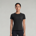 A woman wearing a black t-shirt and black pants